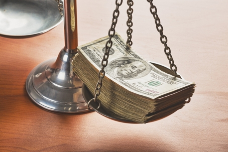 money on scales