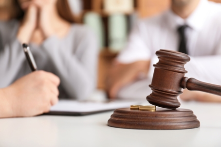 Judge gavel on table in lawyer's office.
